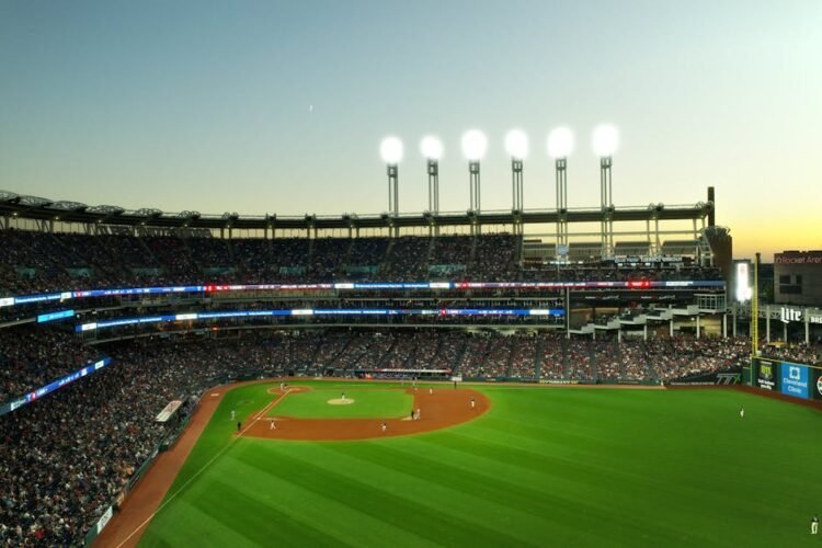 St. Louis Cardinals vs. Boston Red Sox Series Preview April 2026 1 A vibrant twilight baseball game at Cleveland's Progressive Field, capturing the lively atmosphere.